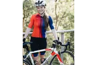 Bright Red through Orange through Purple Cycle Jersey with black bibs and matching cuffs | Cycling Gear