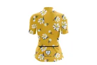 A cycle jersey with a buttercup yellow body with scattered white flowers | Cycling Jersey