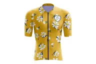 A cycle jersey with a buttercup yellow body with scattered white flowers | Cycling Jersey